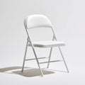 Chaise pliante aux lignes épurées, coloris blanc